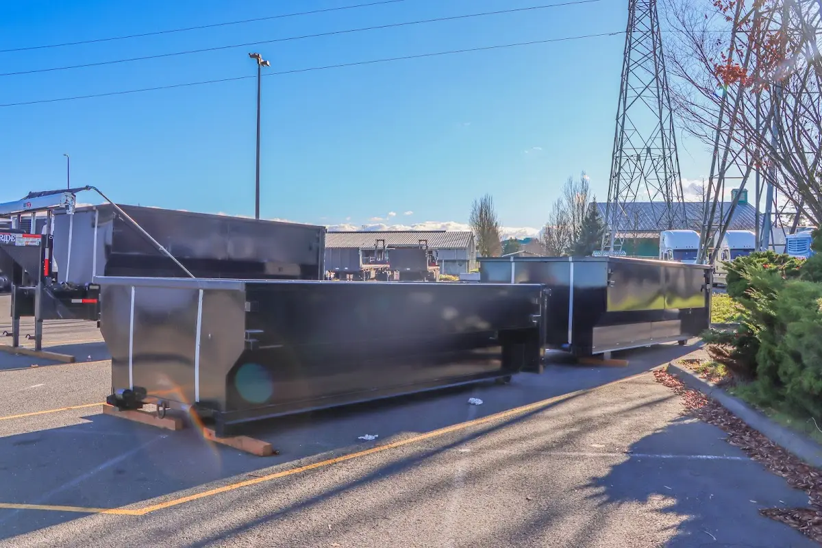 Roll-off dumpster ready for waste disposal at job site for Yard Waste Dumpster Rental in West Palm Beach